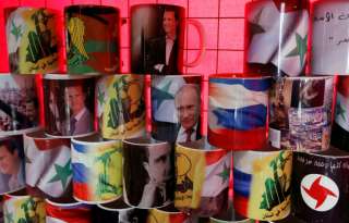 ترامب وماي يؤكدان وجود ”فرصة” لإقناع روسيا بالتخلي عن الأسد
