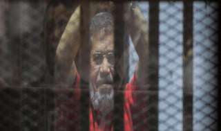 أسرة مرسي تدين صمت العالم عن اضطهاده