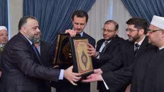 سوريا | علماء السلطان يؤلفون تفسير جديد يوافق هوى بشار