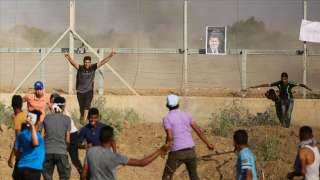 فلسطينيون يرفعون صور ”مرسي” بـ”مسيرات العودة” شرقي غزة