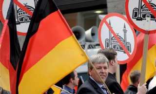 أوروبا ...الصراع على الهوية تبدأه ألمانيا بالحرب على الحجاب